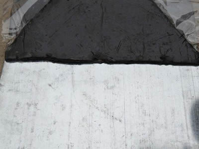 Steel butyl putty rubber waterstop with black butyl putty and steel plate.